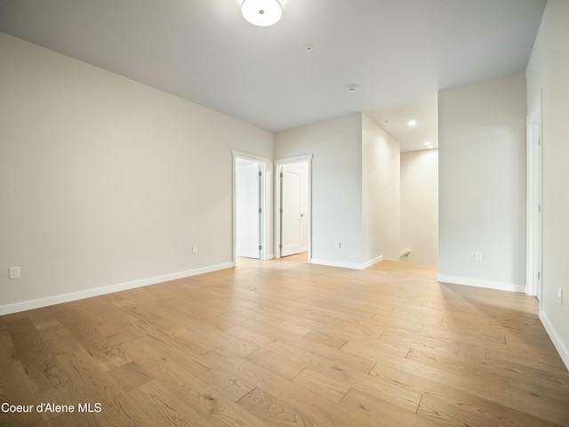 993 E Railroad Ave, Post Falls, ID 83854 - spare room featuring light wood-type flooring and recessed lighting
