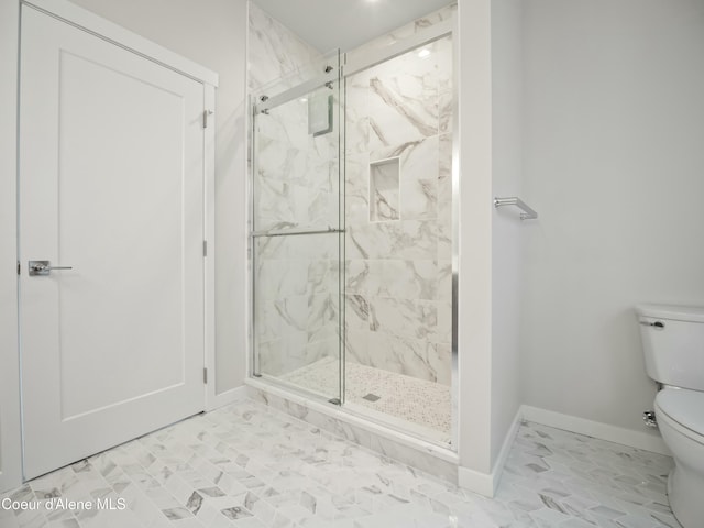 993 E Railroad Ave, Post Falls, ID 83854 - bathroom featuring toilet and a marble finish shower
