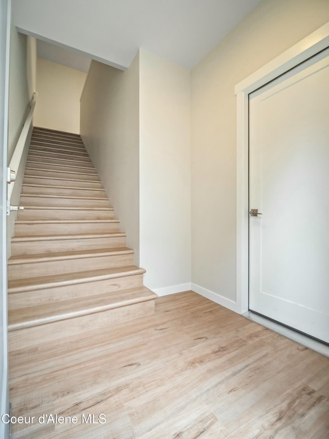 993 E Railroad Ave, Post Falls, ID 83854 - stairs featuring wood finished floors and baseboards