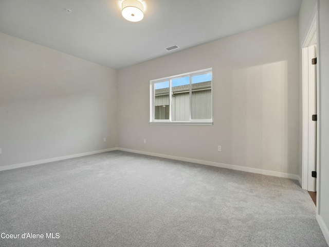 995 E Railroad Ave, Post Falls, ID 83854 - spare room with baseboards and carpet floors
