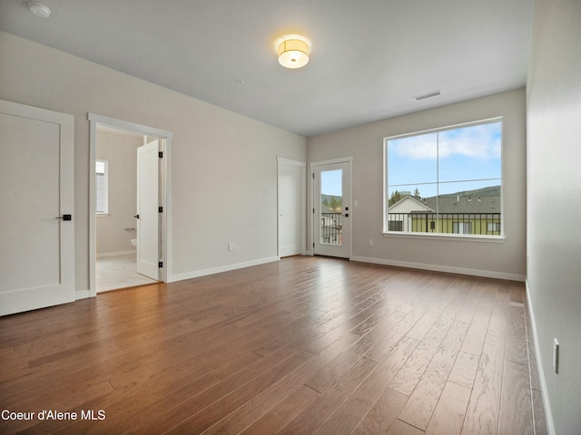 995 E Railroad Ave, Post Falls, ID 83854 - unfurnished room with wood finished floors and a smoke detector