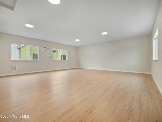 995 E Railroad Ave, Post Falls, ID 83854 - spare room with light wood-style floors, a wall mounted air conditioner, and recessed lighting
