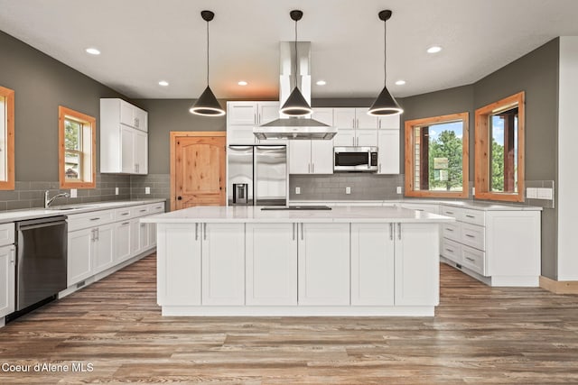 24 Bellflower, Blanchard, ID 83804 - kitchen with appliances with stainless steel finishes, white cabinetry, plenty of natural light, and recessed lighting