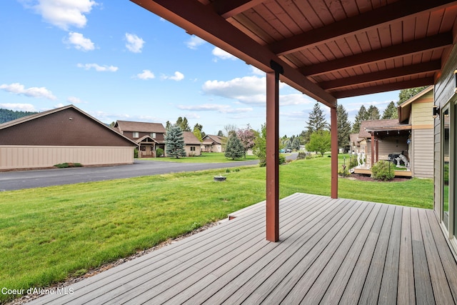 24 Bellflower, Blanchard, ID 83804 - wooden terrace featuring a lawn and a residential view
