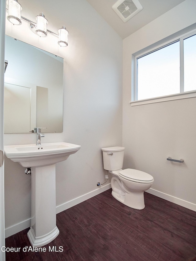 962 E Railroad Ave, Post Falls, ID 83854 - bathroom with wood finished floors and lofted ceiling