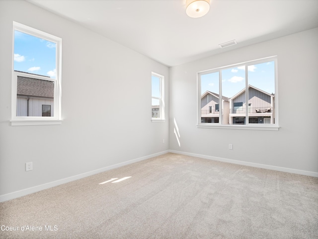 962 E Railroad Ave, Post Falls, ID 83854 - carpeted empty room with baseboards