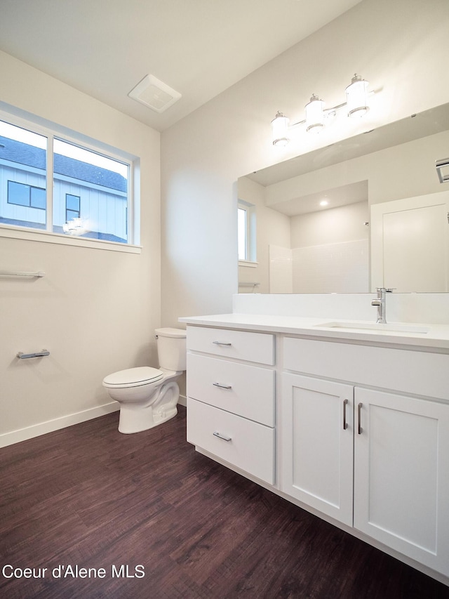 962 E Railroad Ave, Post Falls, ID 83854 - bathroom featuring vanity and wood finished floors