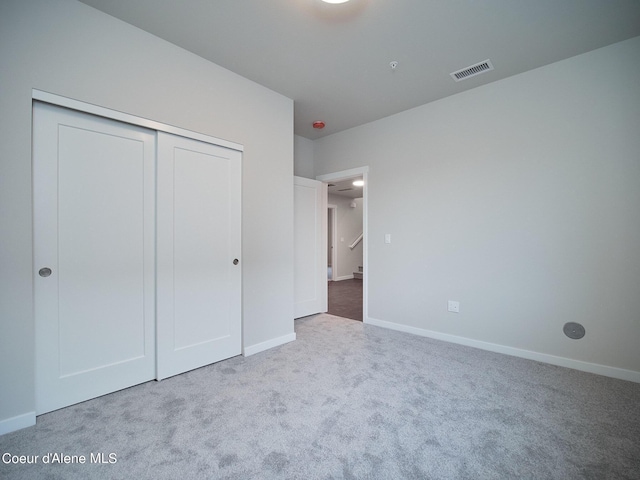 962 E Railroad Ave, Post Falls, ID 83854 - unfurnished bedroom featuring carpet flooring and a closet