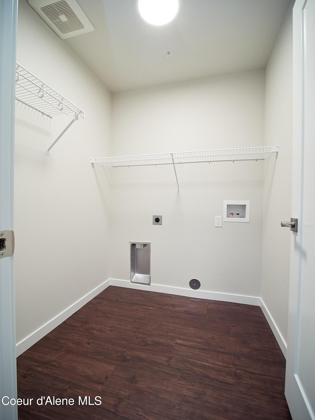 962 E Railroad Ave, Post Falls, ID 83854 - laundry room with hookup for a washing machine, wood finished floors, and hookup for an electric dryer