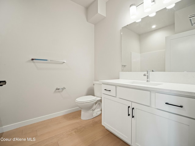 1033 E Railroad Ave, Post Falls, ID 83854 - full bath featuring wood finished floors and vanity