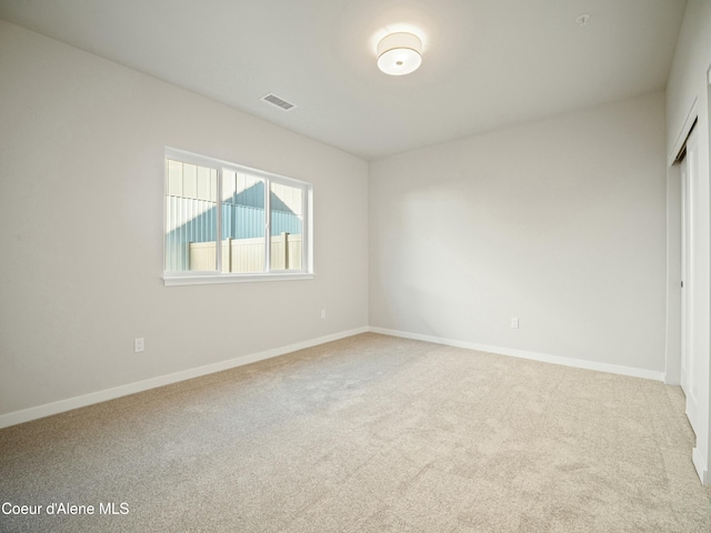 1033 E Railroad Ave, Post Falls, ID 83854 - spare room with carpet flooring and baseboards