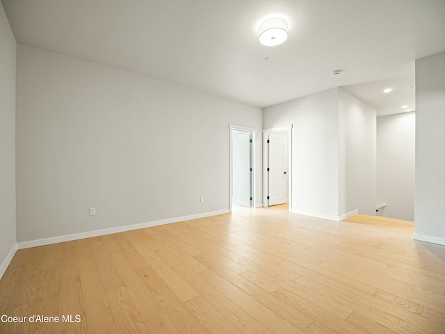 1033 E Railroad Ave, Post Falls, ID 83854 - unfurnished room with light wood-style flooring and recessed lighting