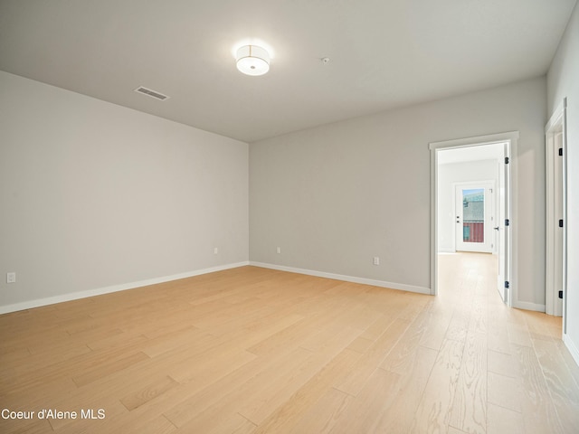 1033 E Railroad Ave, Post Falls, ID 83854 - spare room with light wood-type flooring and baseboards
