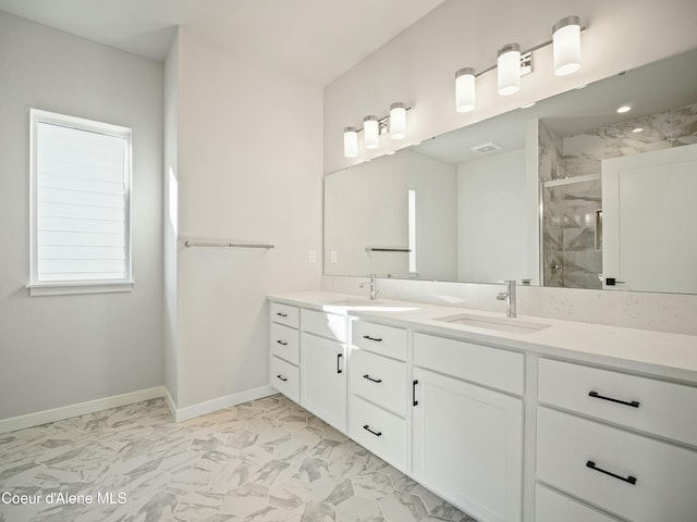 1033 E Railroad Ave, Post Falls, ID 83854 - bathroom featuring double vanity, a marble finish shower, and marble look tiles