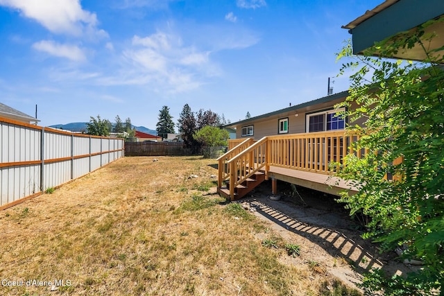 59 W Lincoln Ave, Priest River, ID 83856 - fenced backyard with a deck