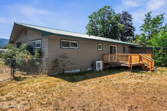 59 W Lincoln Ave, Priest River, ID 83856 - back of house with a wooden deck and a metal roof