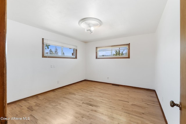 59 W Lincoln Ave, Priest River, ID 83856 - empty room featuring light wood-style floors and baseboards