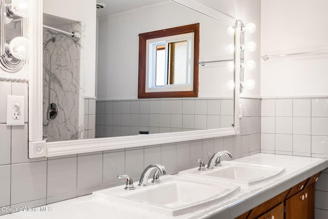 59 W Lincoln Ave, Priest River, ID 83856 - bathroom with double vanity, tile walls, and a shower