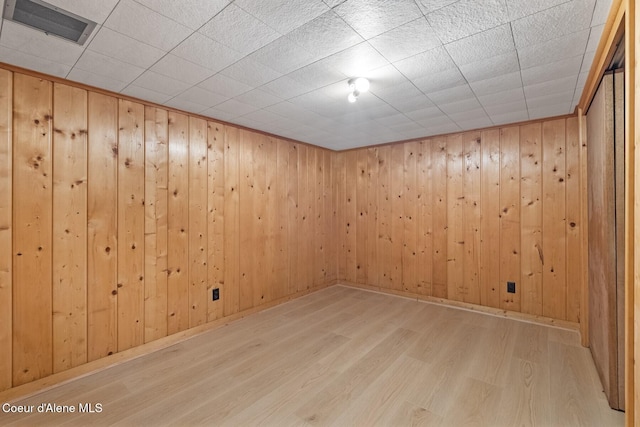 59 W Lincoln Ave, Priest River, ID 83856 - empty room featuring wood finished floors and wood walls