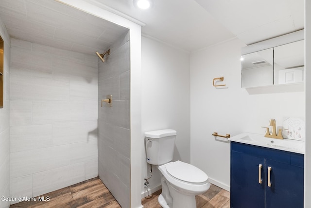 59 W Lincoln Ave, Priest River, ID 83856 - bathroom with vanity, wood finished floors, and tiled shower