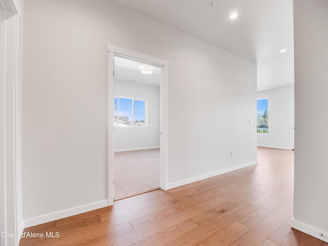 1037 E Railroad Ave, Post Falls, ID 83854 - empty room with plenty of natural light, light wood finished floors, and recessed lighting