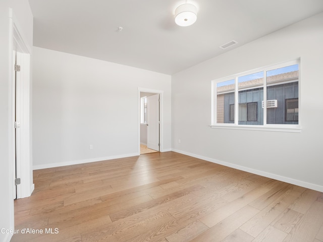 1037 E Railroad Ave, Post Falls, ID 83854 - spare room with light wood-style flooring and baseboards