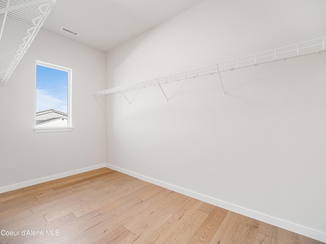 1037 E Railroad Ave, Post Falls, ID 83854 - spacious closet featuring light wood finished floors