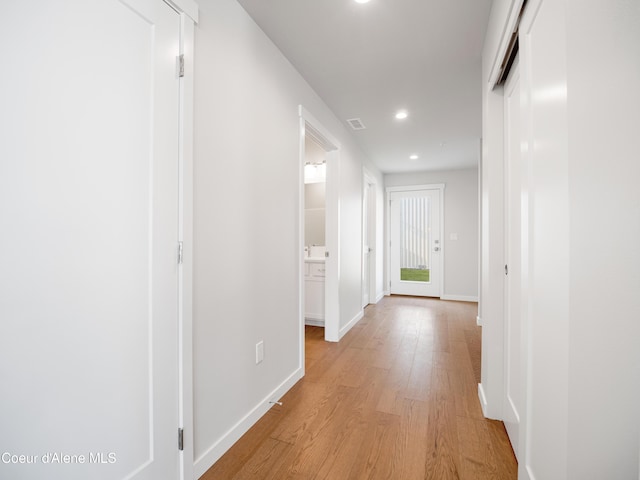 1037 E Railroad Ave, Post Falls, ID 83854 - corridor featuring light wood finished floors and recessed lighting