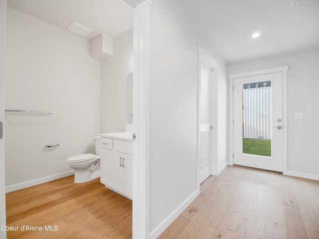 1037 E Railroad Ave, Post Falls, ID 83854 - bathroom with vanity, wood finished floors, and recessed lighting