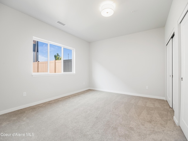 1037 E Railroad Ave, Post Falls, ID 83854 - unfurnished bedroom featuring carpet flooring and a closet