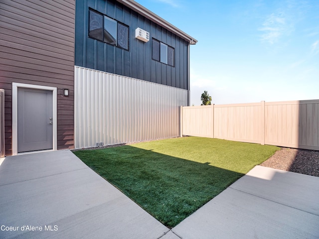 1037 E Railroad Ave, Post Falls, ID 83854 - fenced backyard with a patio