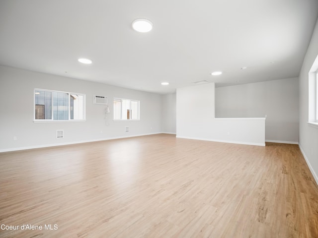 1037 E Railroad Ave, Post Falls, ID 83854 - spare room featuring light wood-style flooring and recessed lighting