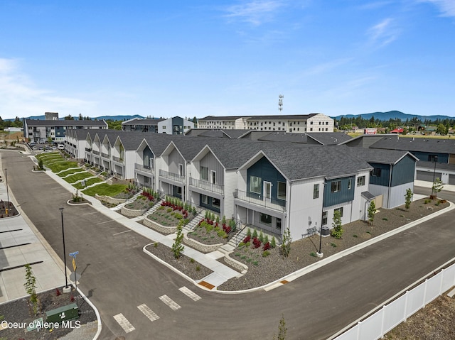 1037 E Railroad Ave, Post Falls, ID 83854 - aerial view of residential area featuring mountains
