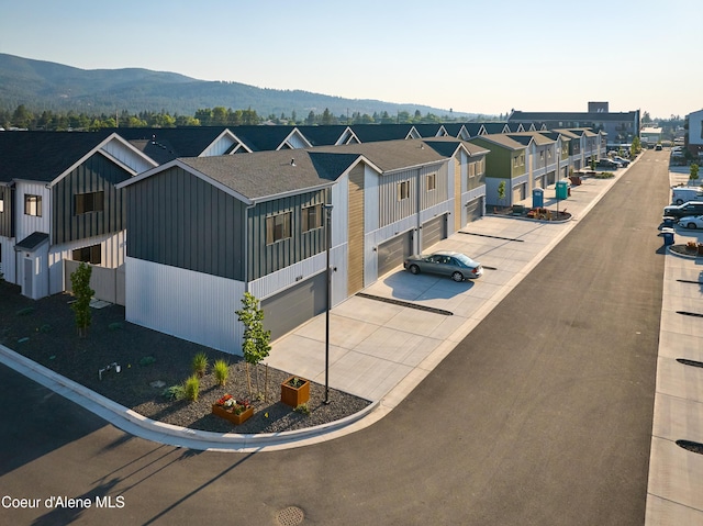 1037 E Railroad Ave, Post Falls, ID 83854 - aerial view of residential area with a mountainous background