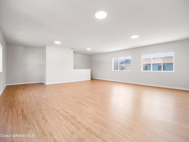 1037 E Railroad Ave, Post Falls, ID 83854 - empty room featuring light wood-style flooring and recessed lighting