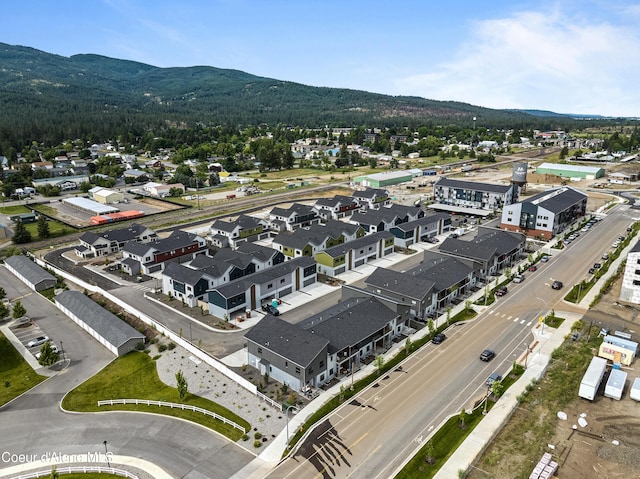 1037 E Railroad Ave, Post Falls, ID 83854 - aerial perspective of suburban area featuring a mountainous background
