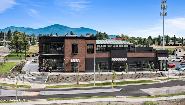 1037 E Railroad Ave, Post Falls, ID 83854 - view of building exterior featuring a mountain view