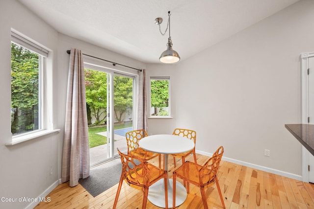 5188 E Twila Ct, Post Falls, ID 83854 - dining room with light wood-style floors and healthy amount of natural light