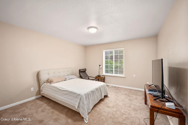 5188 E Twila Ct, Post Falls, ID 83854 - bedroom featuring light carpet and a textured ceiling