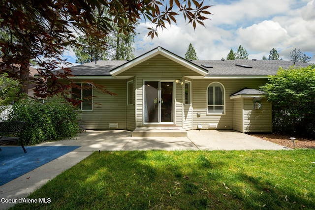 5188 E Twila Ct, Post Falls, ID 83854 - view of front facade with a front lawn, a patio area, and roof with shingles