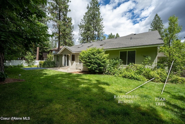 5188 E Twila Ct, Post Falls, ID 83854 - back of property with a patio, entry steps, and roof with shingles