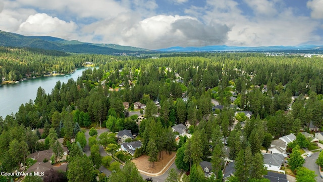 5188 E Twila Ct, Post Falls, ID 83854 - aerial view of a heavily wooded area and a water and mountain view