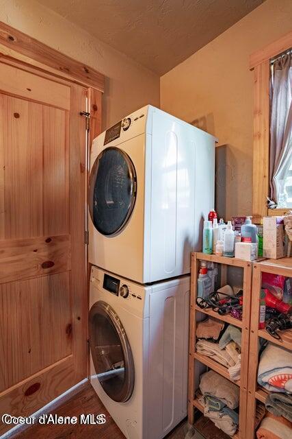11 Elk Horn, Clark Fork, ID 83811 - laundry area featuring estacked washer and dryer and wood finished floors