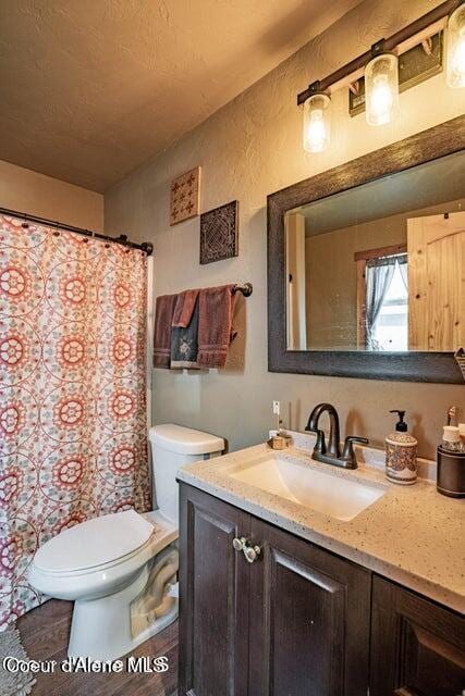 11 Elk Horn, Clark Fork, ID 83811 - bathroom with vanity and a shower with shower curtain