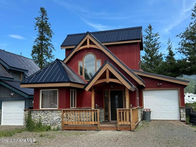11 Elk Horn, Clark Fork, ID 83811 - rustic home featuring stone siding, a metal roof, a porch, and driveway