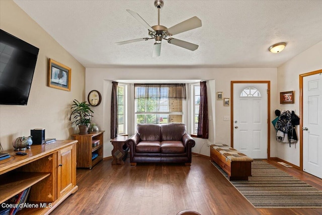 3569 E Jordan Dr, Post Falls, ID 83854 - entryway featuring wood finished floors, a textured ceiling, and a ceiling fan