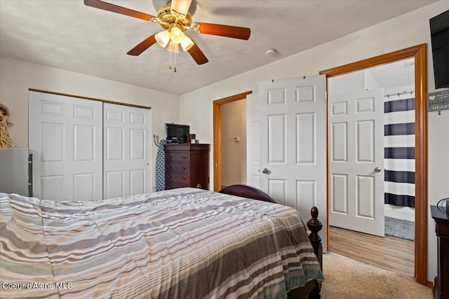 3569 E Jordan Dr, Post Falls, ID 83854 - carpeted bedroom with a closet and ceiling fan