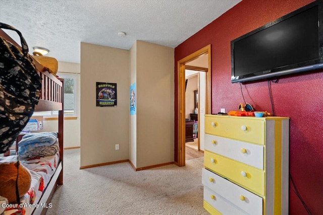3569 E Jordan Dr, Post Falls, ID 83854 - bedroom with light colored carpet and a textured ceiling