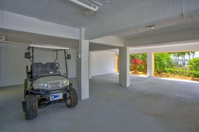 garage with a carport