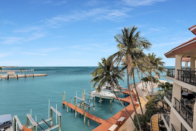 exterior space with a water view and boat lift